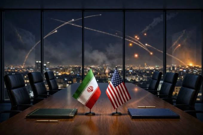 العلمان الأمريكي والإيراني خلال محادثات لوقف التصعيد العسكري - US and Iran ceasefire talks